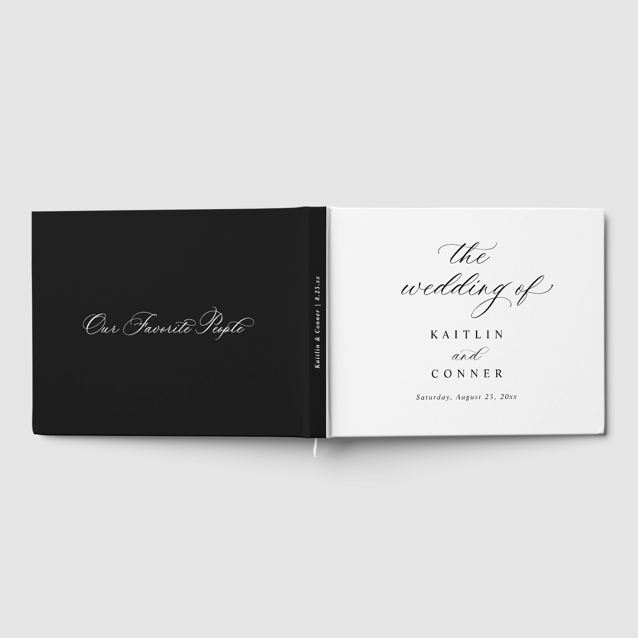 Wedding guest book in black and white with personalized names and formal typography