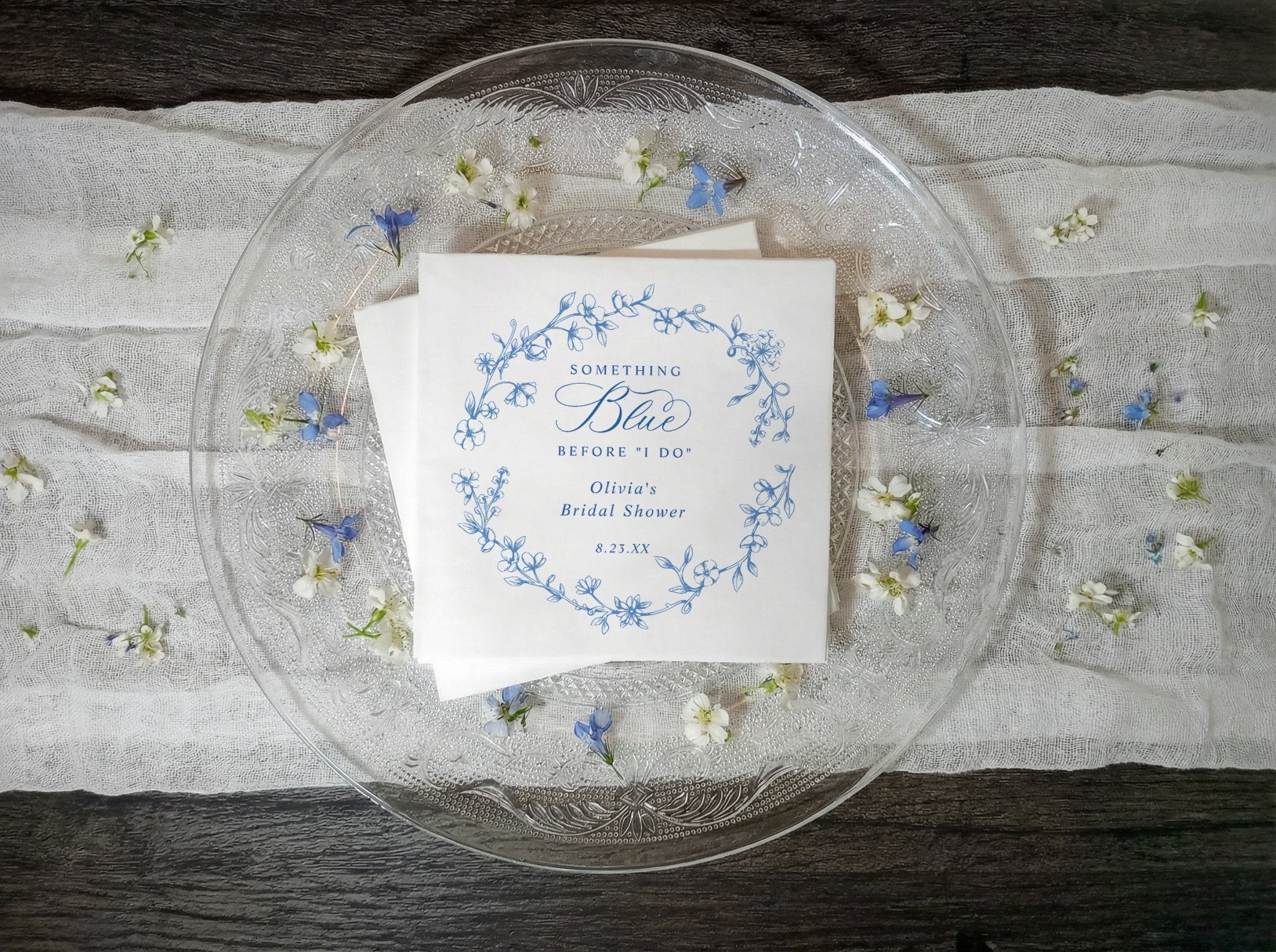 Blue and white wildflower bridal shower napkins with French toile and calligraphy text