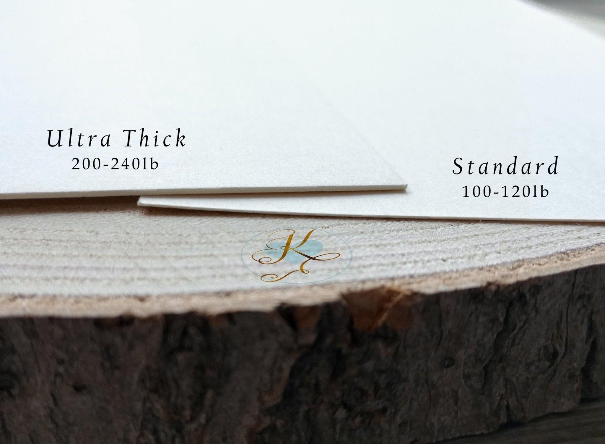 Stacked printed 4x6 table number cards with elegant script, shown on premium white cardstock.