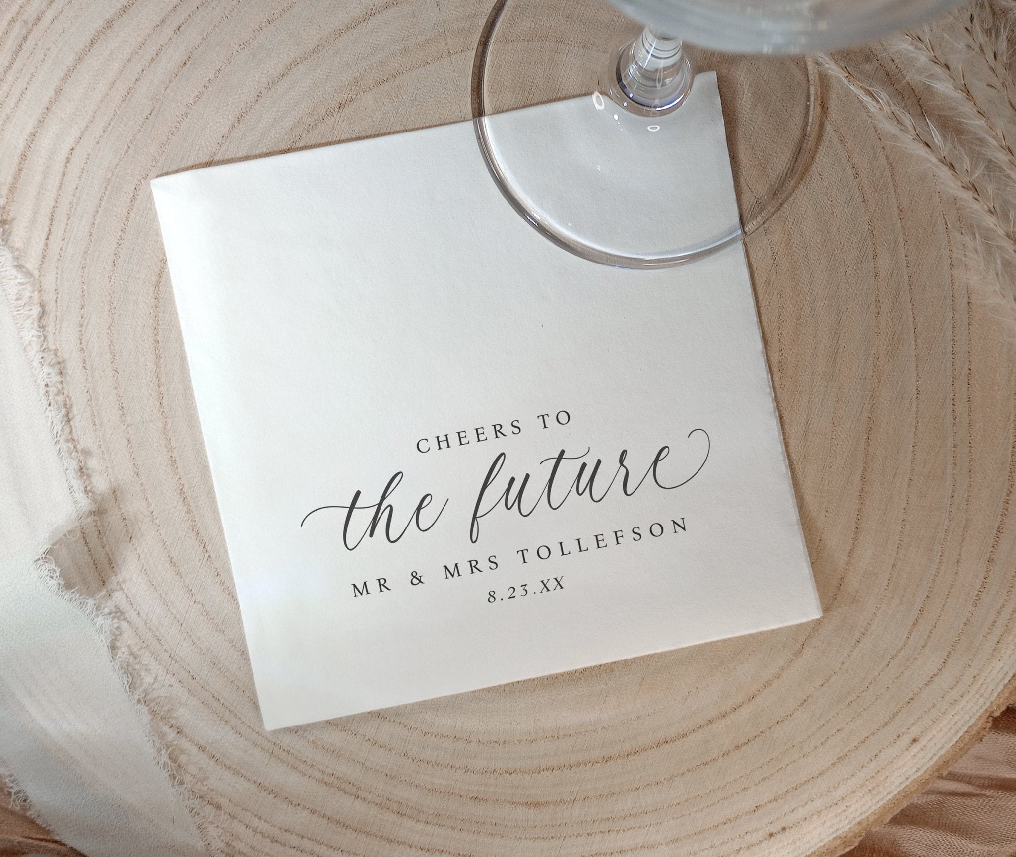 Black and white “Cheers to the Future” napkins for engagement parties and bridal showers