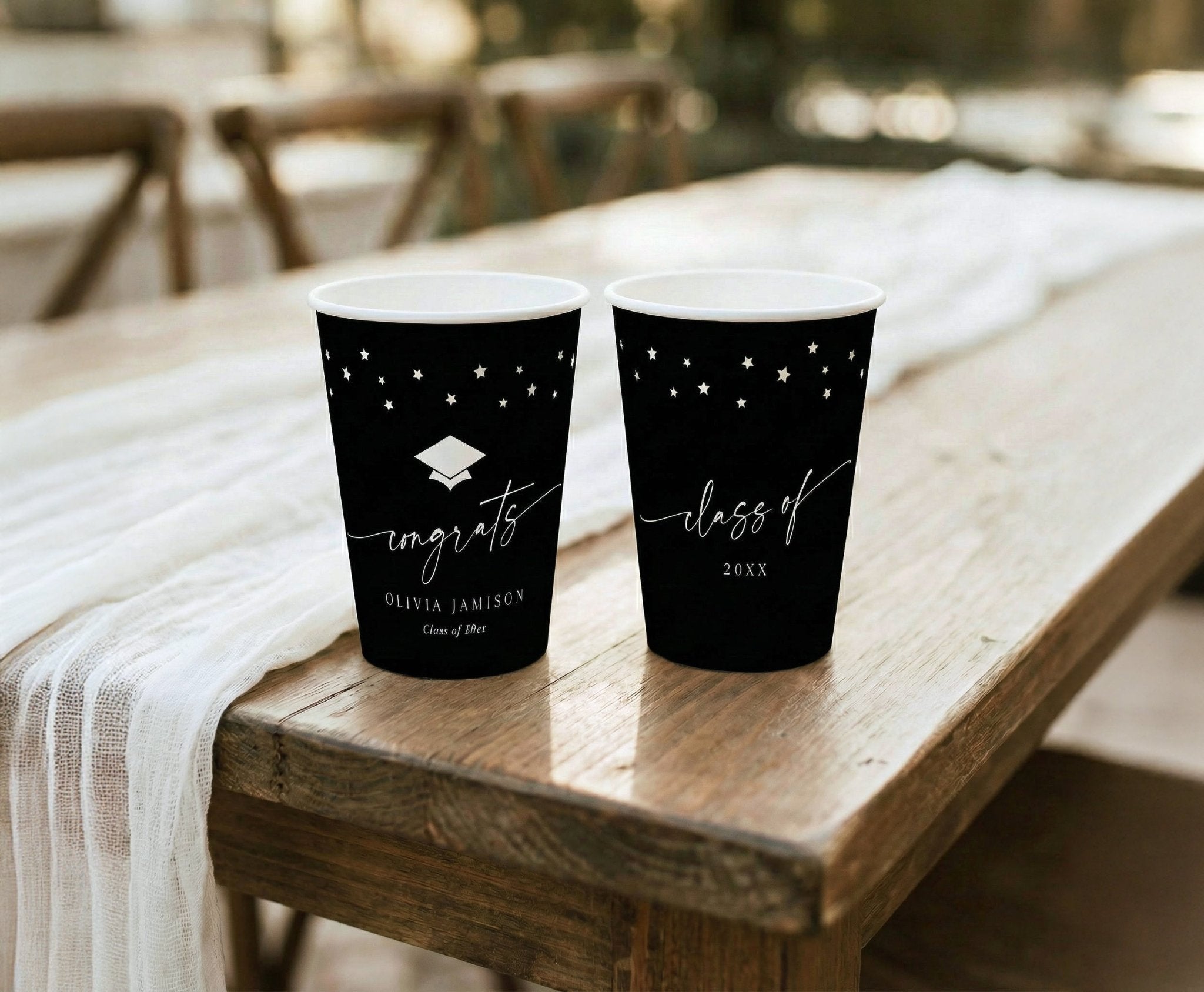 Personalized graduation cups with minimalist script congrats design