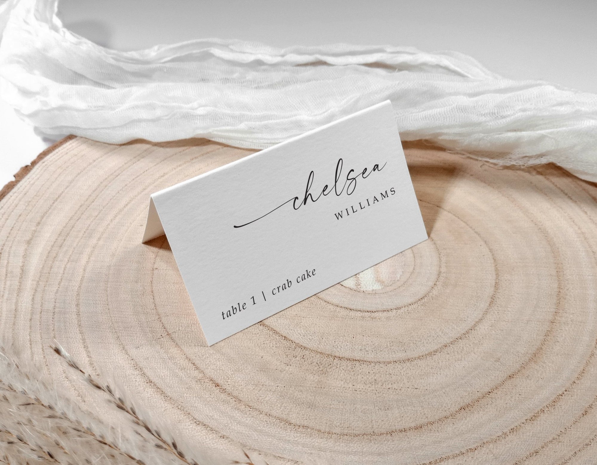 Personalized printed name cards for weddings with minimalist script and table number