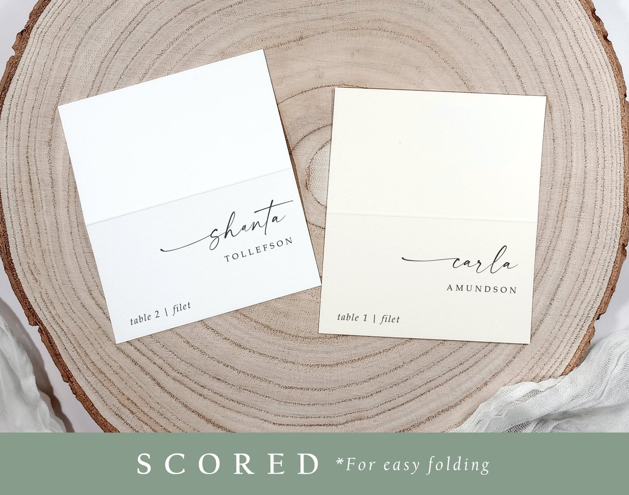 Custom scored place cards for weddings in modern calligraphy style, ready to fold