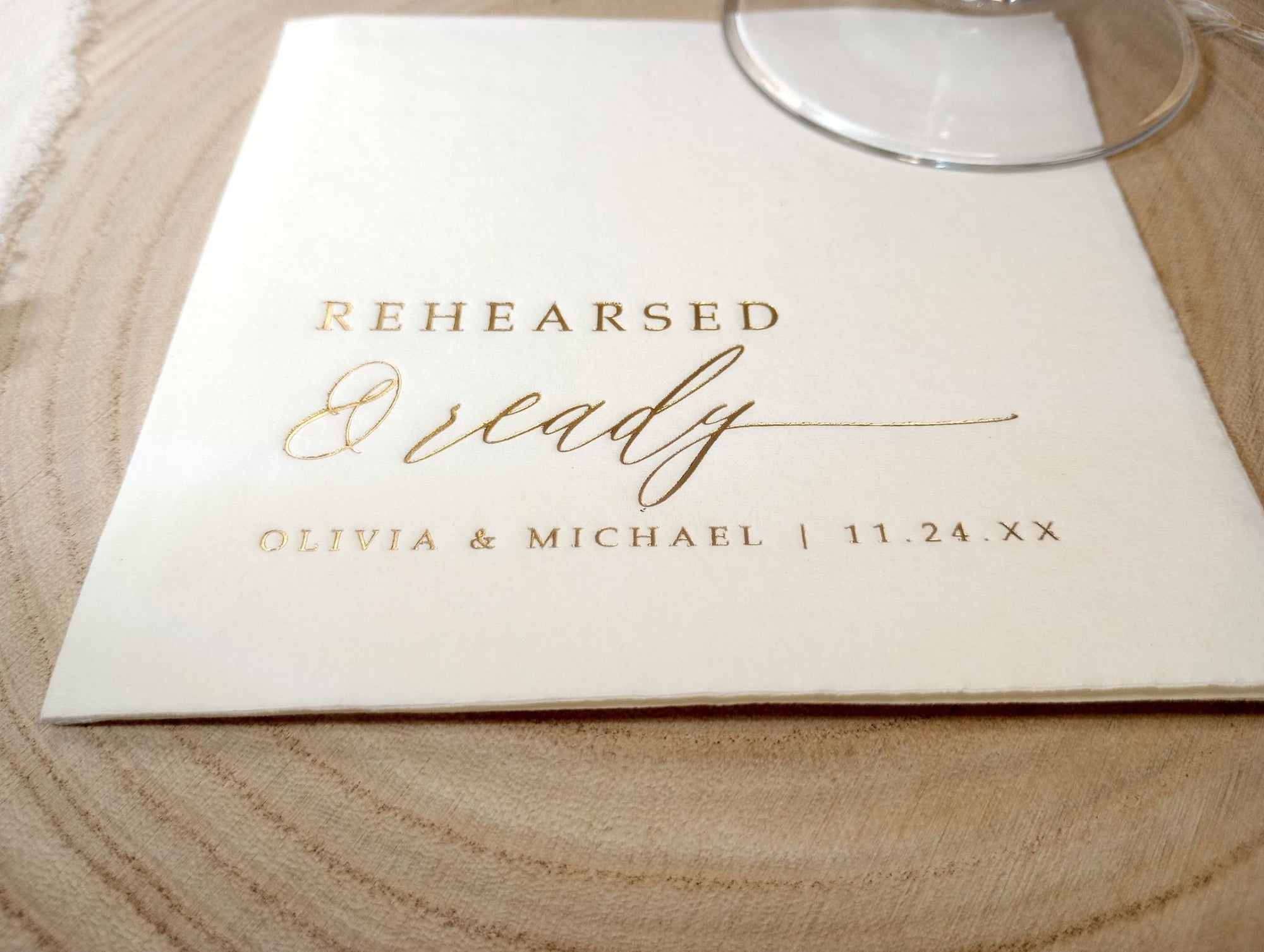 Personalized foil rehearsal dinner napkin reading “Rehearsed & Ready” with names and date