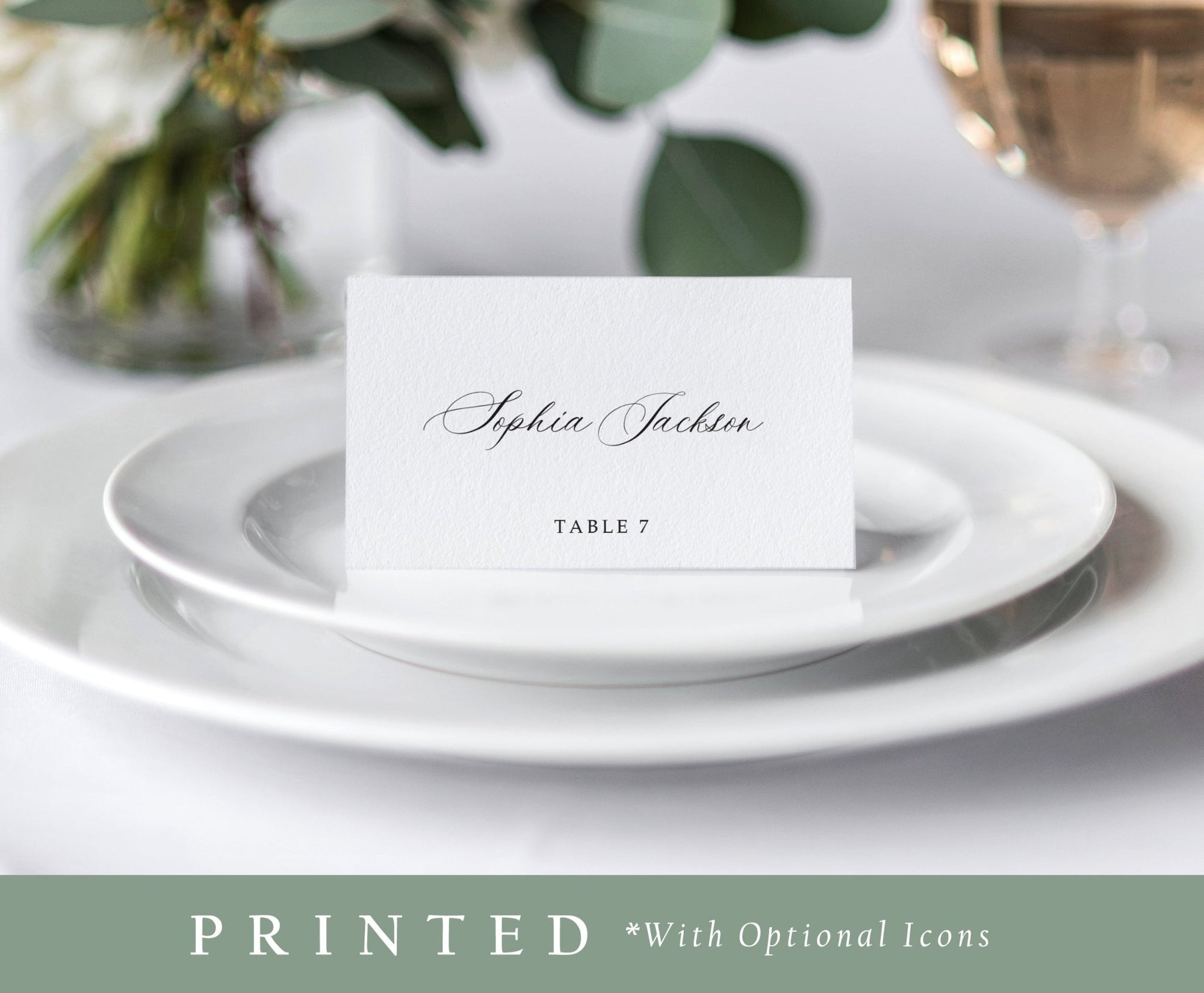 Elegant printed name card placed on a white plate at a formal wedding table setting.
