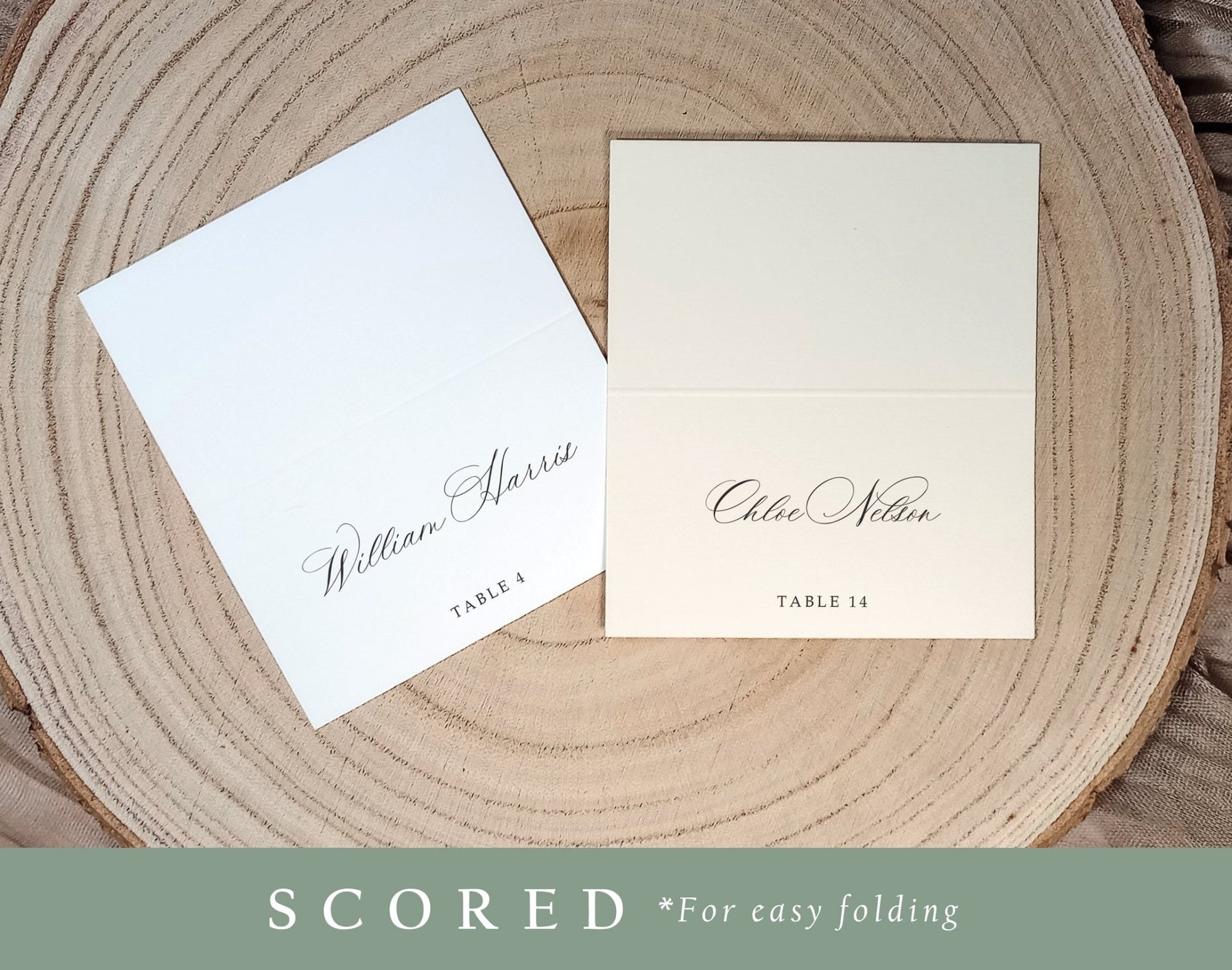 Printed place cards shown in flat and folded (scored) formats on a wood charger, serif font style.