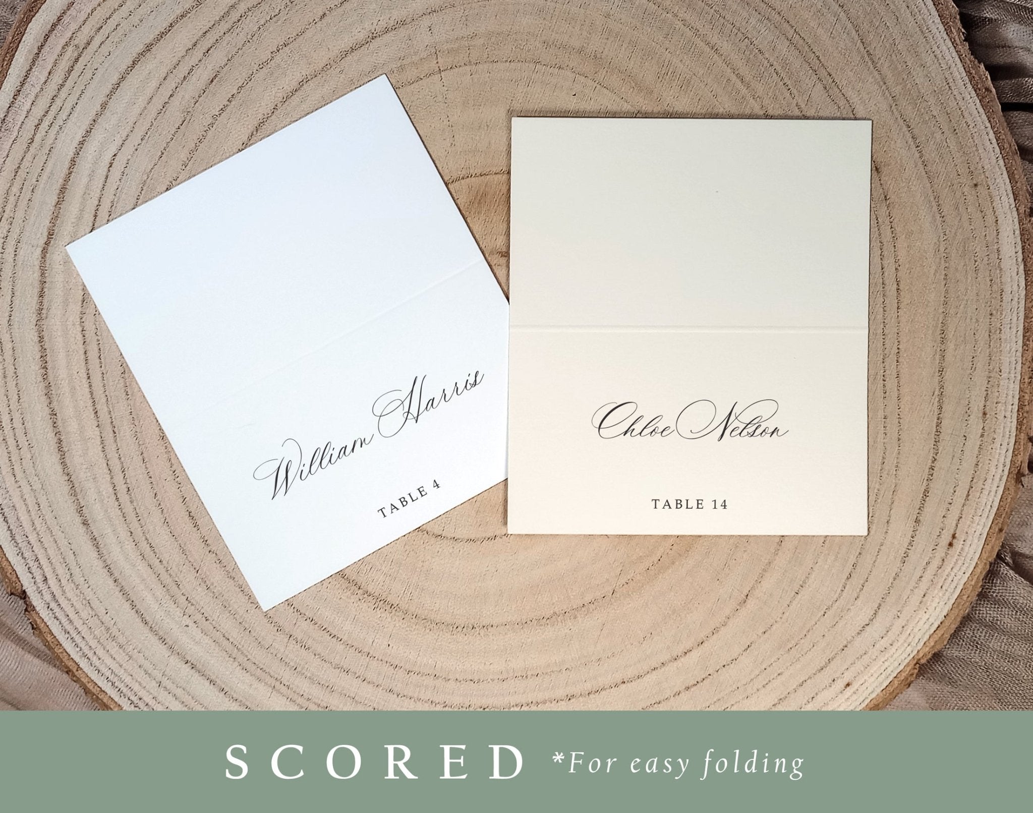 Printed place cards shown in flat and folded (scored) formats on a wood charger, serif font style.