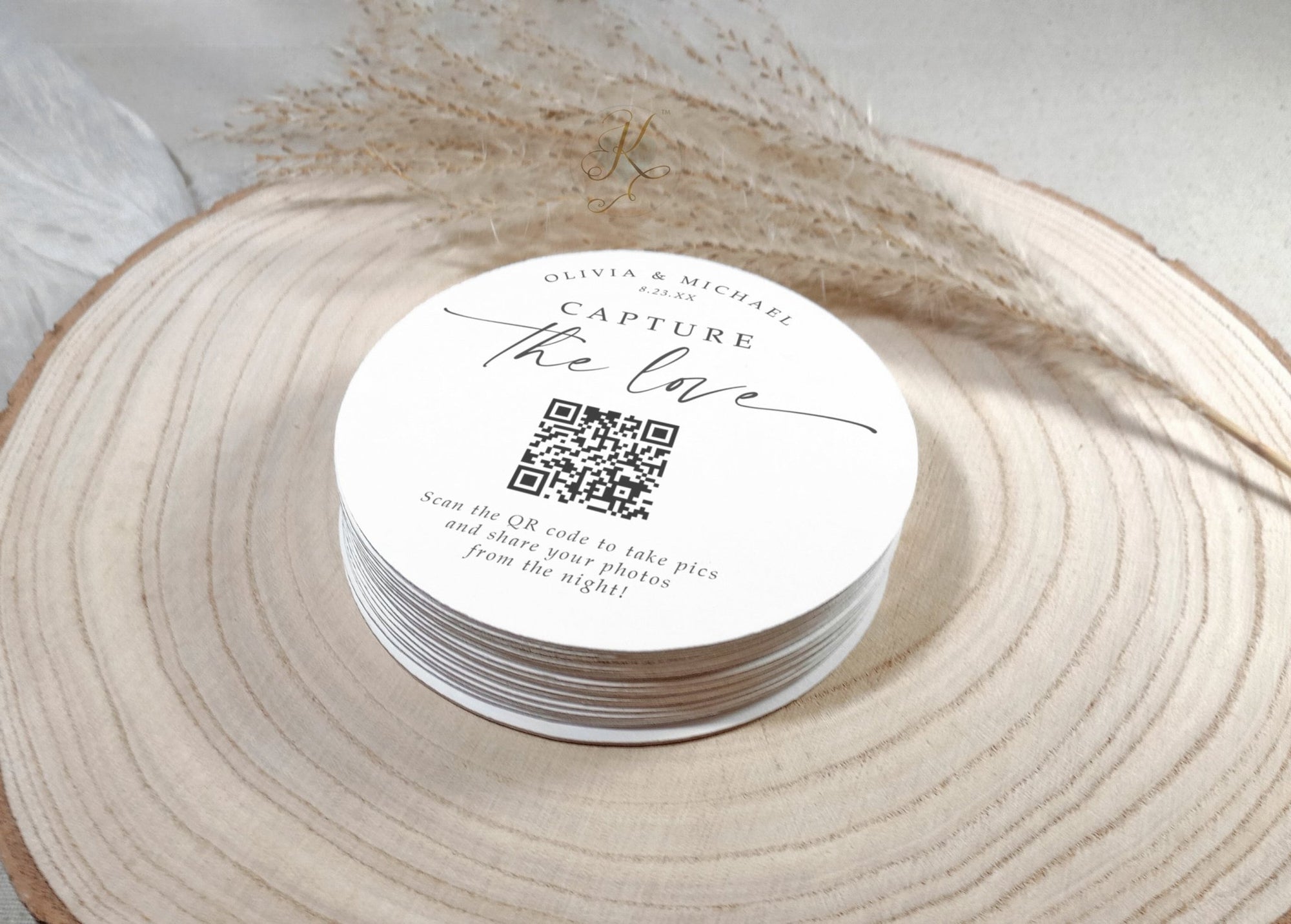 Stack of wedding QR code coasters with clean minimalist layout and scannable link to photo-sharing gallery.