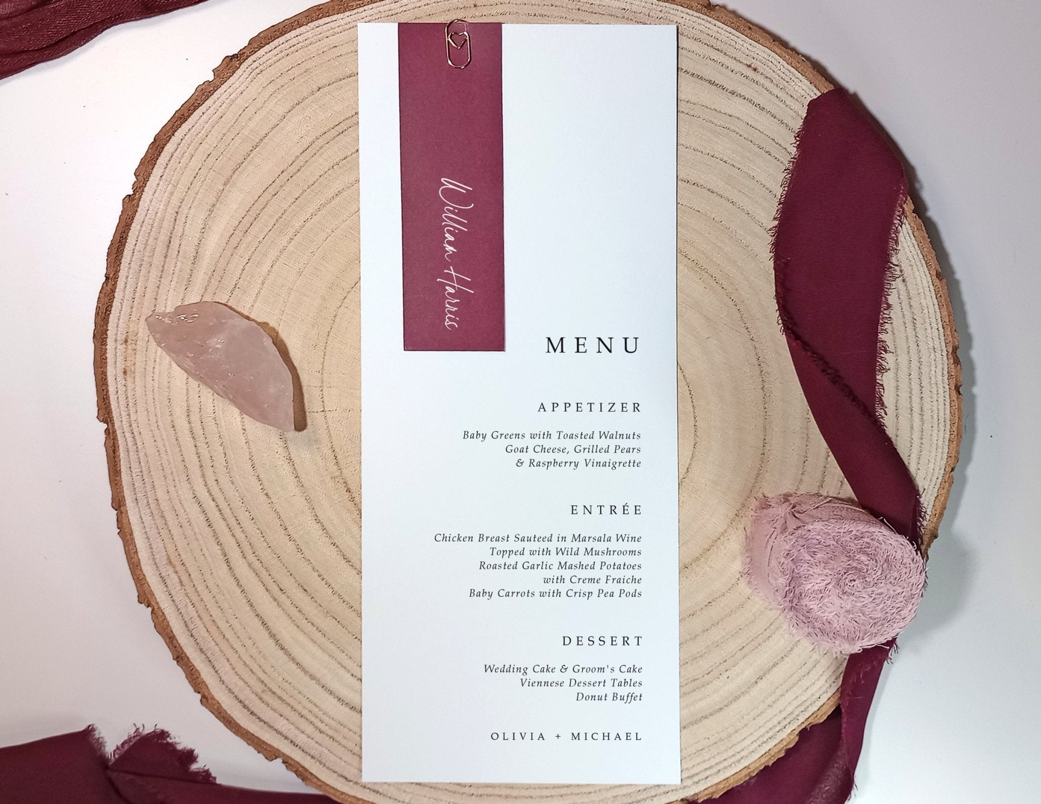 Reception place setting featuring slim name tag and menu card, styled with ribbon accent.
