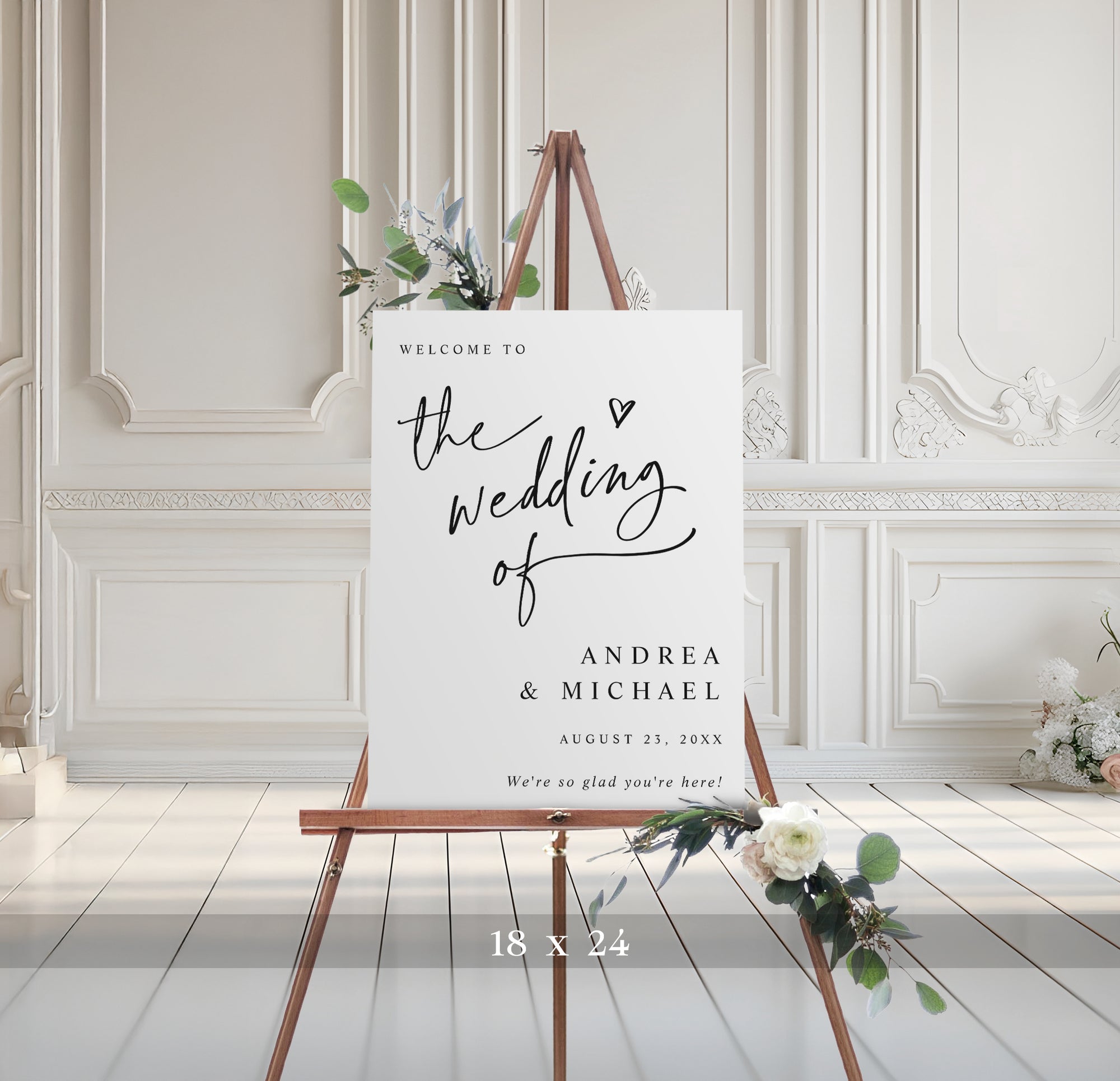 Wedding welcome sign on an easel with decorative flowers in a classic room.