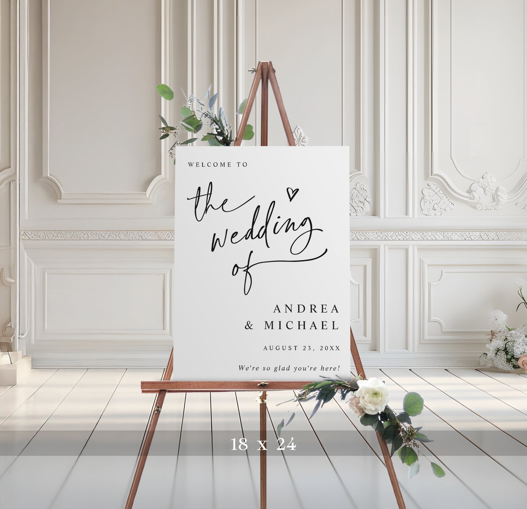 Wedding welcome sign on an easel with decorative flowers in a classic room.