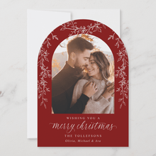 Elegant red flat Christmas card with gold botanical foliage and family photo in arch frame