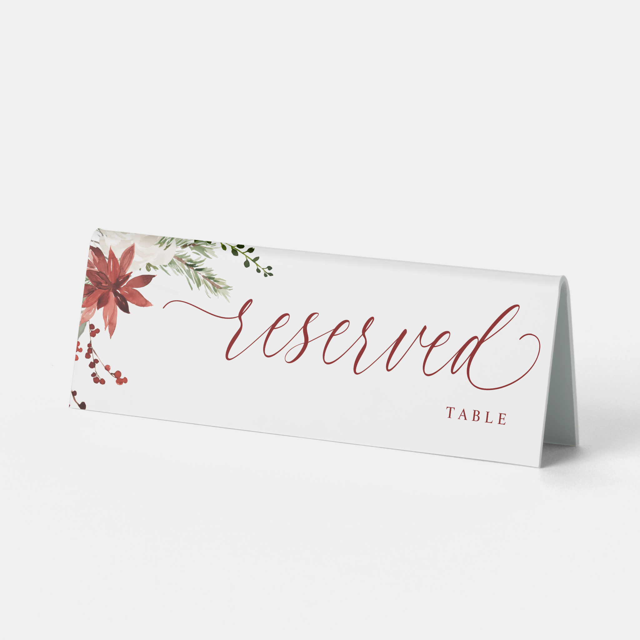 Elegant watercolor Christmas reserved sign with holly berries and greenery design.