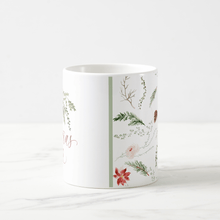 Festive holiday mug featuring watercolor floral and greenery design in red and green tones.