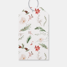 Decorative christmas tag with floral and botanical design on a white background