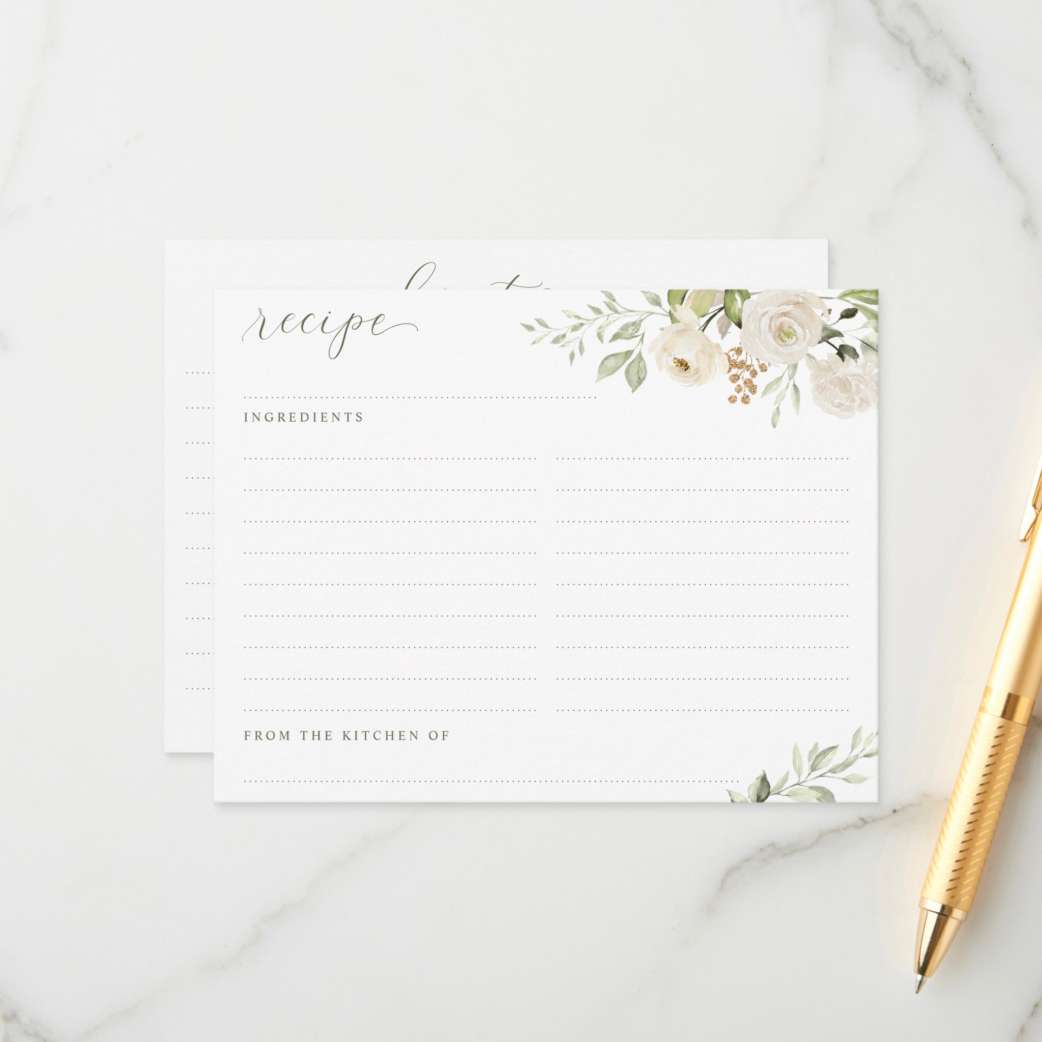Floral recipe card on a marble surface with a gold pen