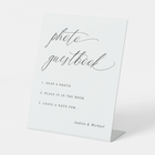 Photo guestbook standing sign with text on a white background