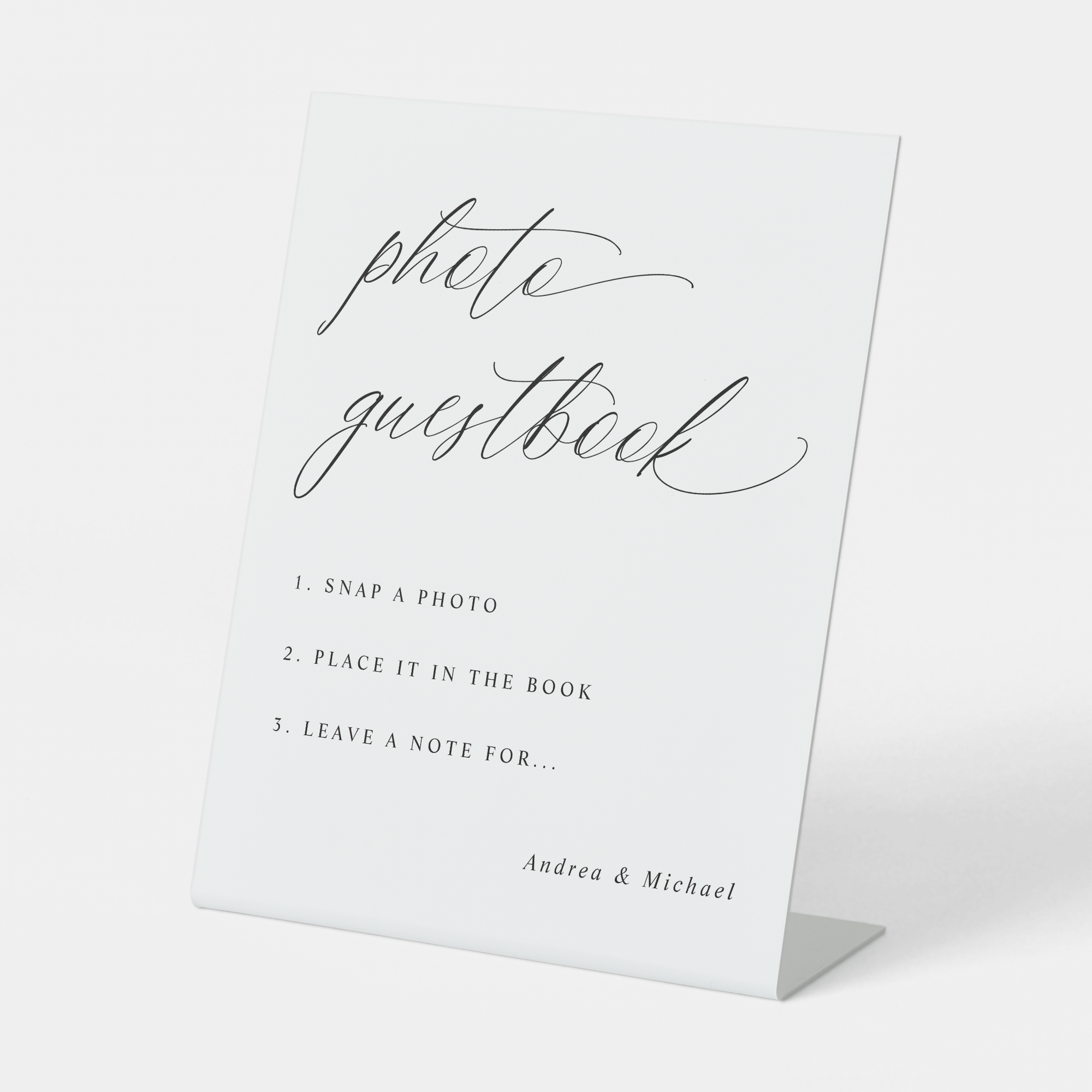 Photo guestbook standing sign with text on a white background