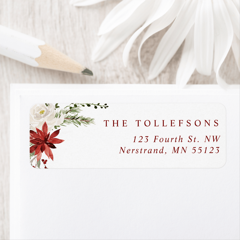 Elegant holiday return address label with watercolor poinsettias, holly berries, and greenery.