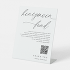 Elegant calligraphy honeymoon fund sign with QR code for wedding gifting.