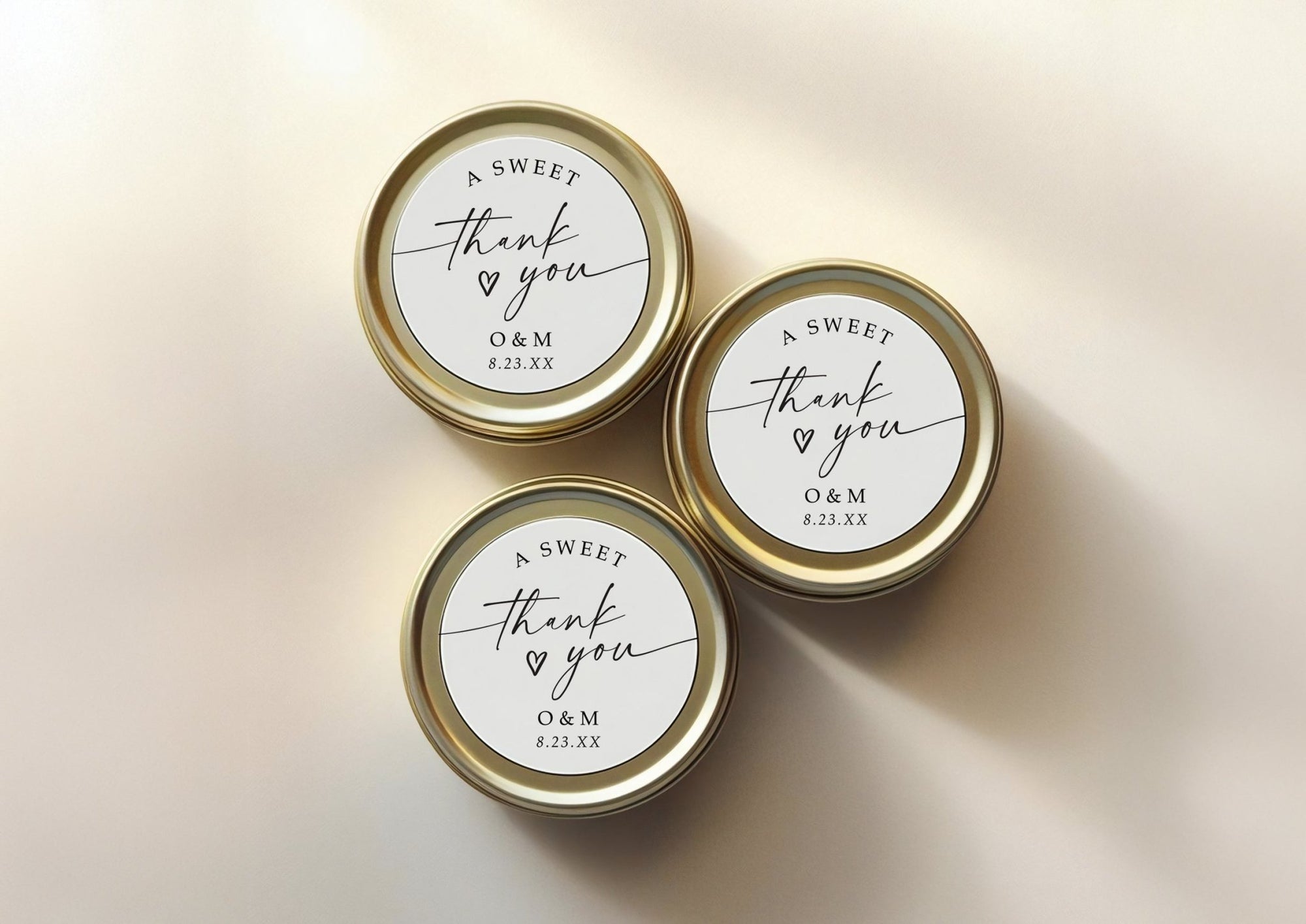 Set of 2-inch personalized round stickers with “a sweet thank you” message, printed in elegant script, perfect for wedding jars, bags, or boxes.