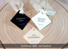 assorted name tags for wine glasses with printed guest names in minimalist font