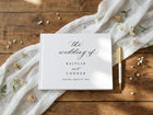 Classic black and white wedding guest book with elegant calligraphy and traditional script
