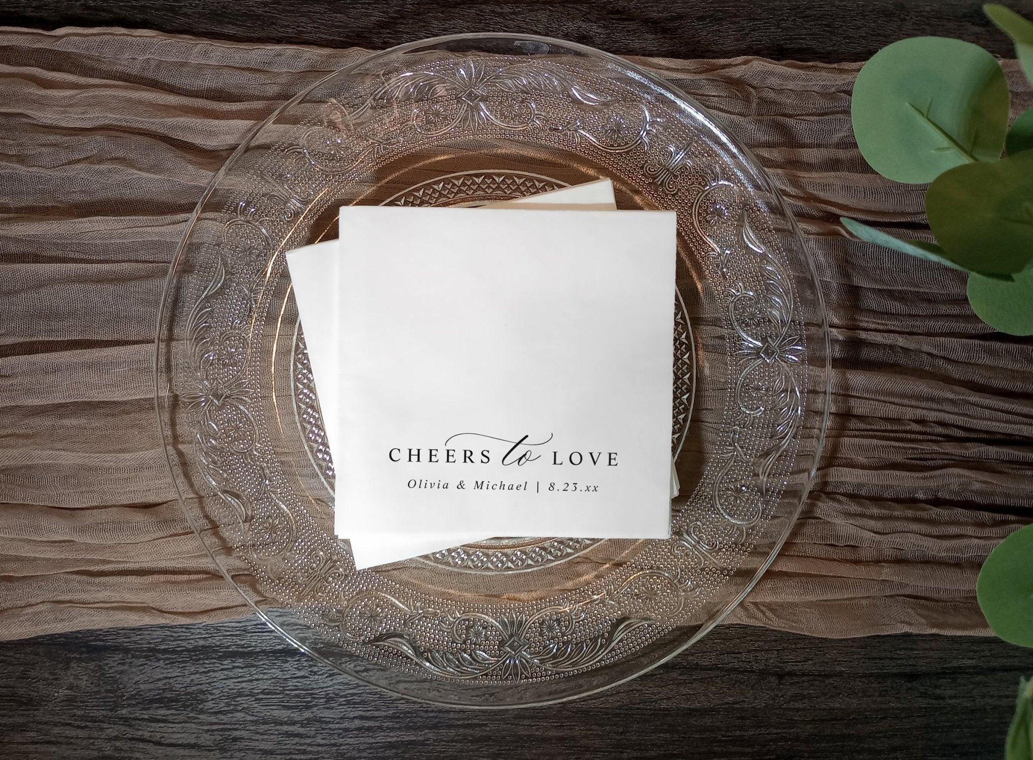 Elegant black and white wedding napkins with calligraphy “cheers to love” design for receptions