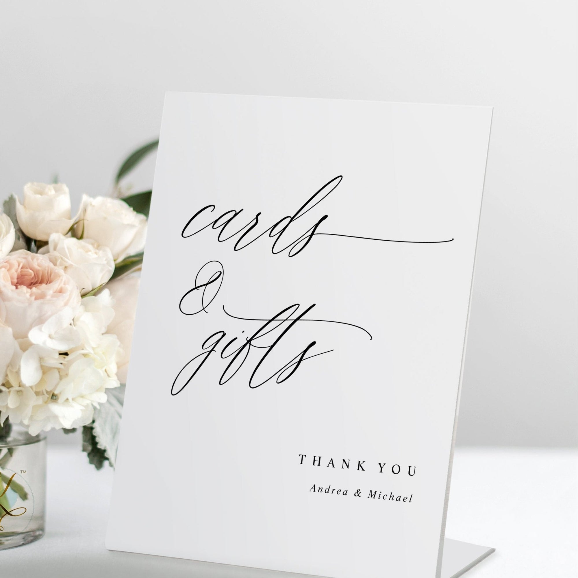 Elegant modern calligraphy sign reading “Cards & Gifts” styled with floral décor.