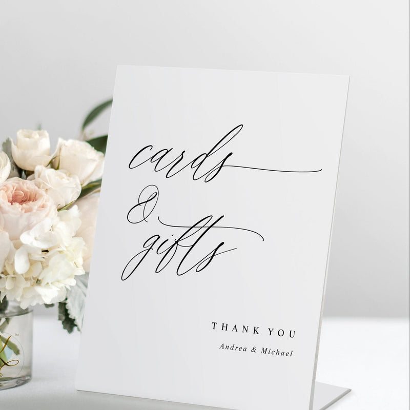 Elegant modern calligraphy sign reading “Cards & Gifts” styled with floral décor.