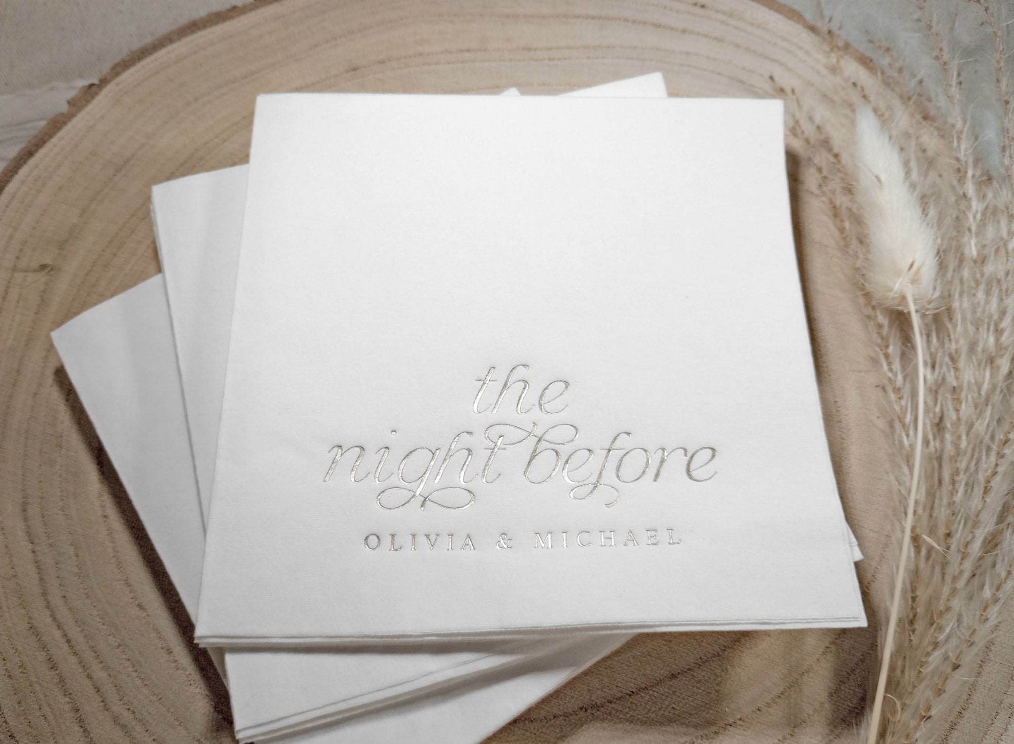 Modern minimalist napkin design styled for a wedding rehearsal dinner