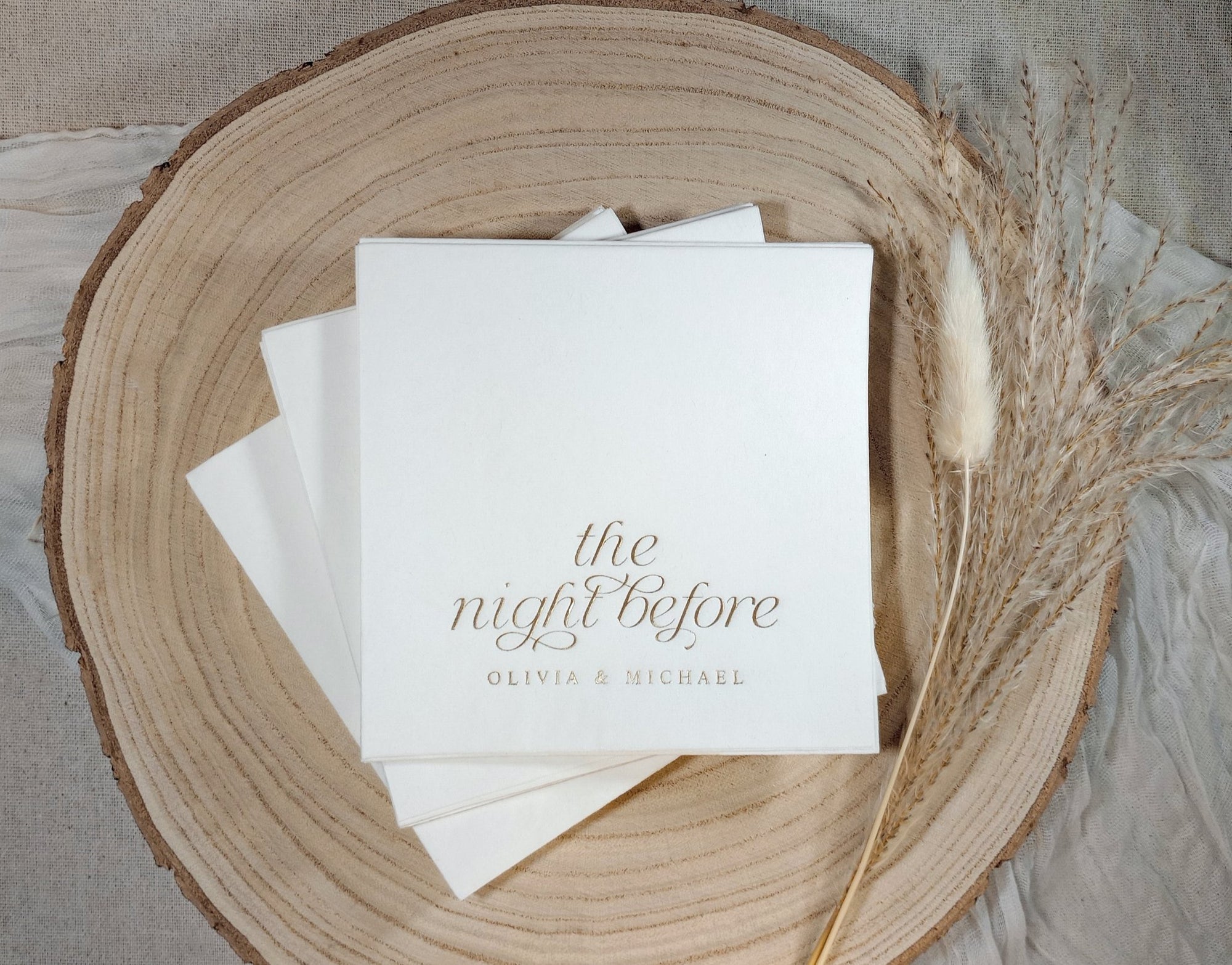 Foil stamped rehearsal dinner napkin with “the night before” in elegant script