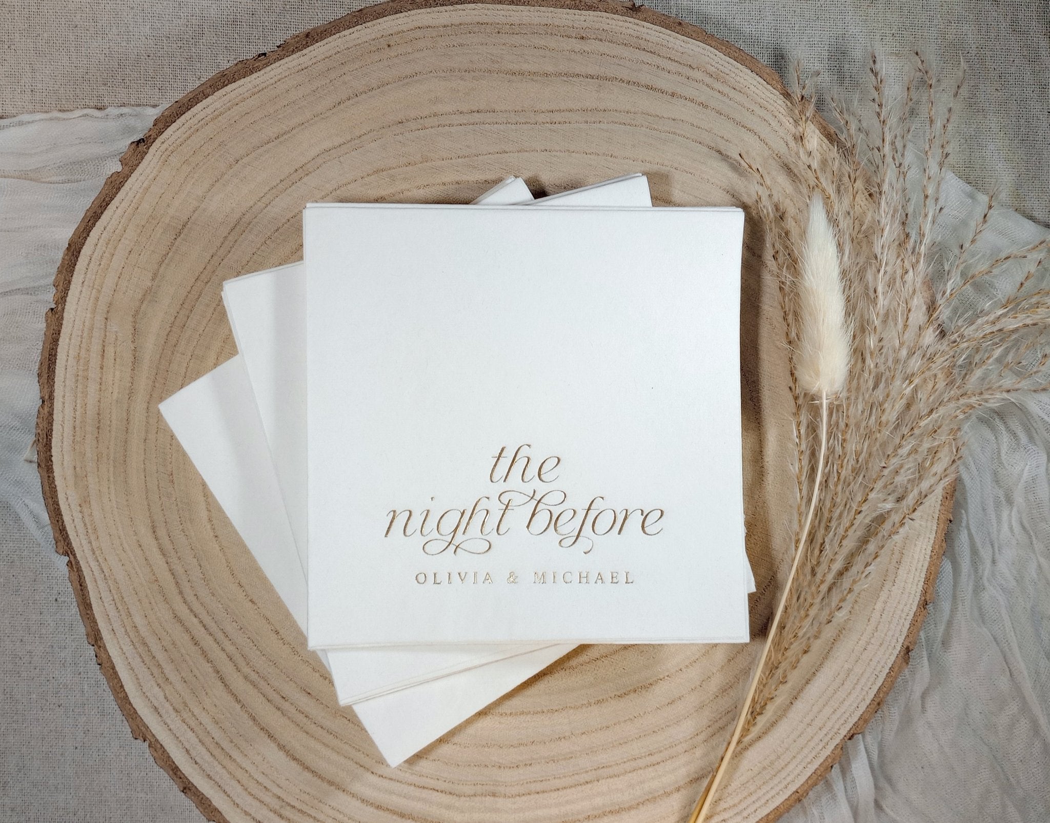 Foil stamped rehearsal dinner napkin with “the night before” in elegant script