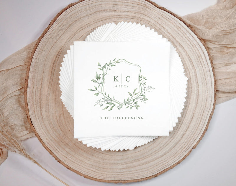 Elegant sage green wedding napkin with watercolor crest and initials