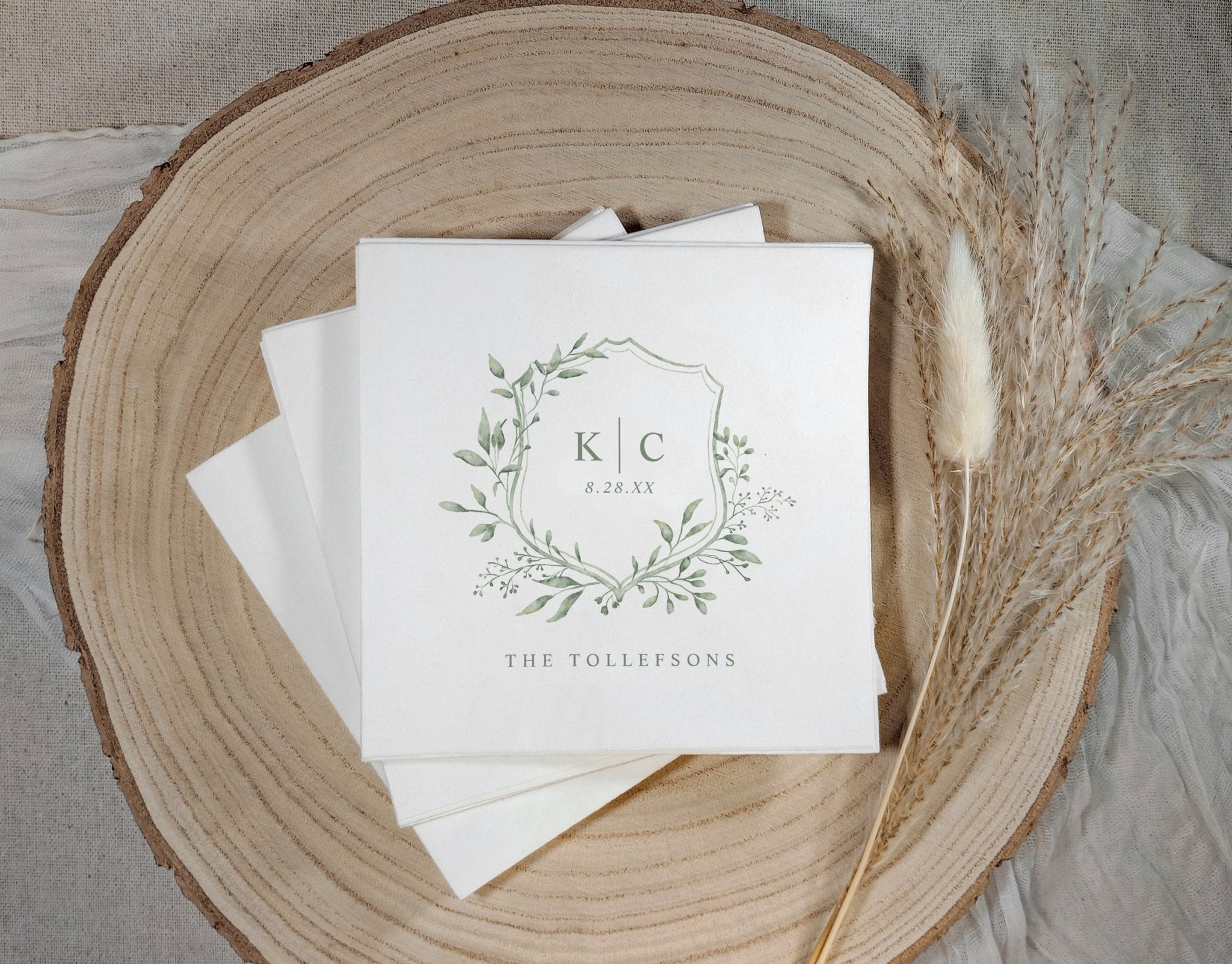 Sage green wedding napkins with traditional watercolor crest wedding logo