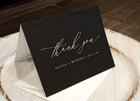 elegant black wedding thank you card with white vintage script and personalized names