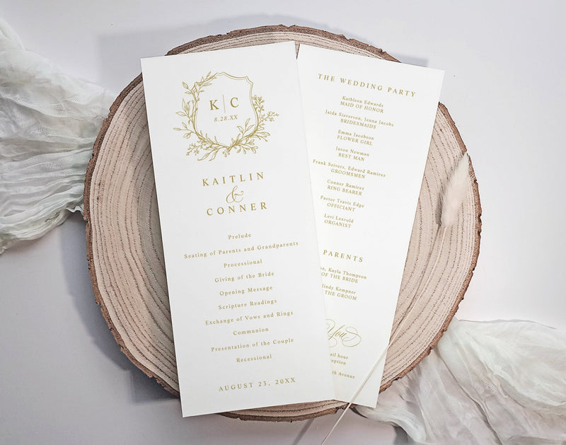 Elegant white and gold wedding program with crest and calligraphy script