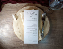 Printed elegant black and white wedding menu cardwith classic calligraphy and formal dinner layout