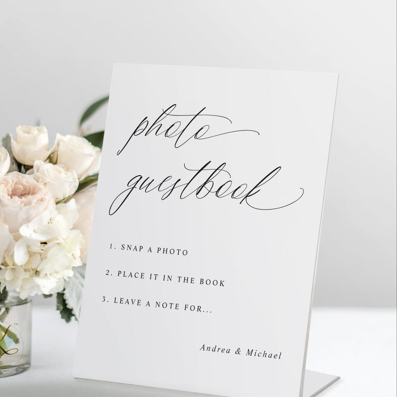Freestanding “Photo Guestbook” wedding sign in romantic calligraphy with step-by-step instructions.