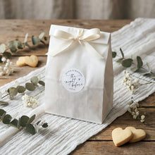 Elegant wedding favor stickers personalized with couple’s names and rehearsal dinner date