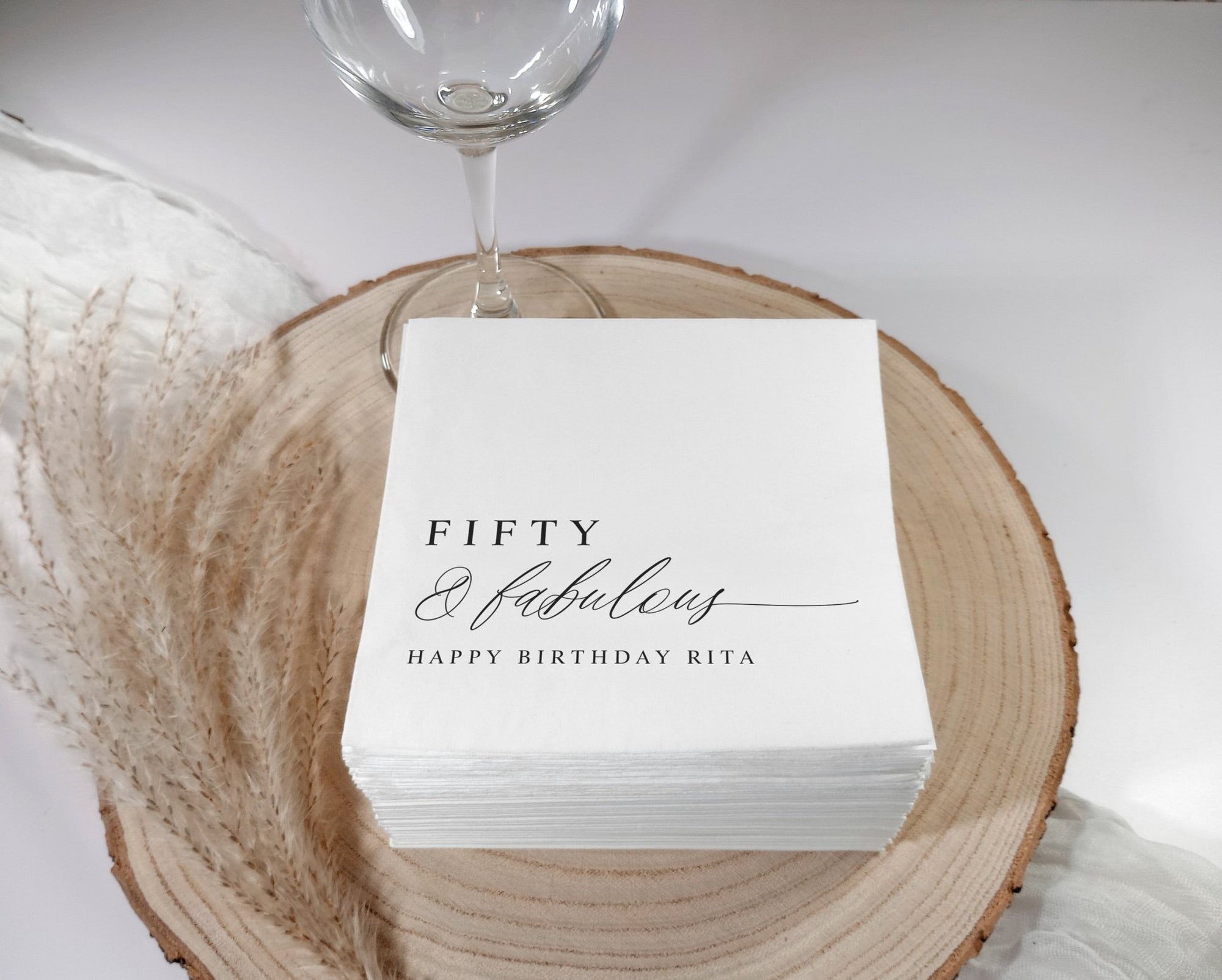 Elegant black fifty & fabulous napkins for modern minimalist 50th birthday party