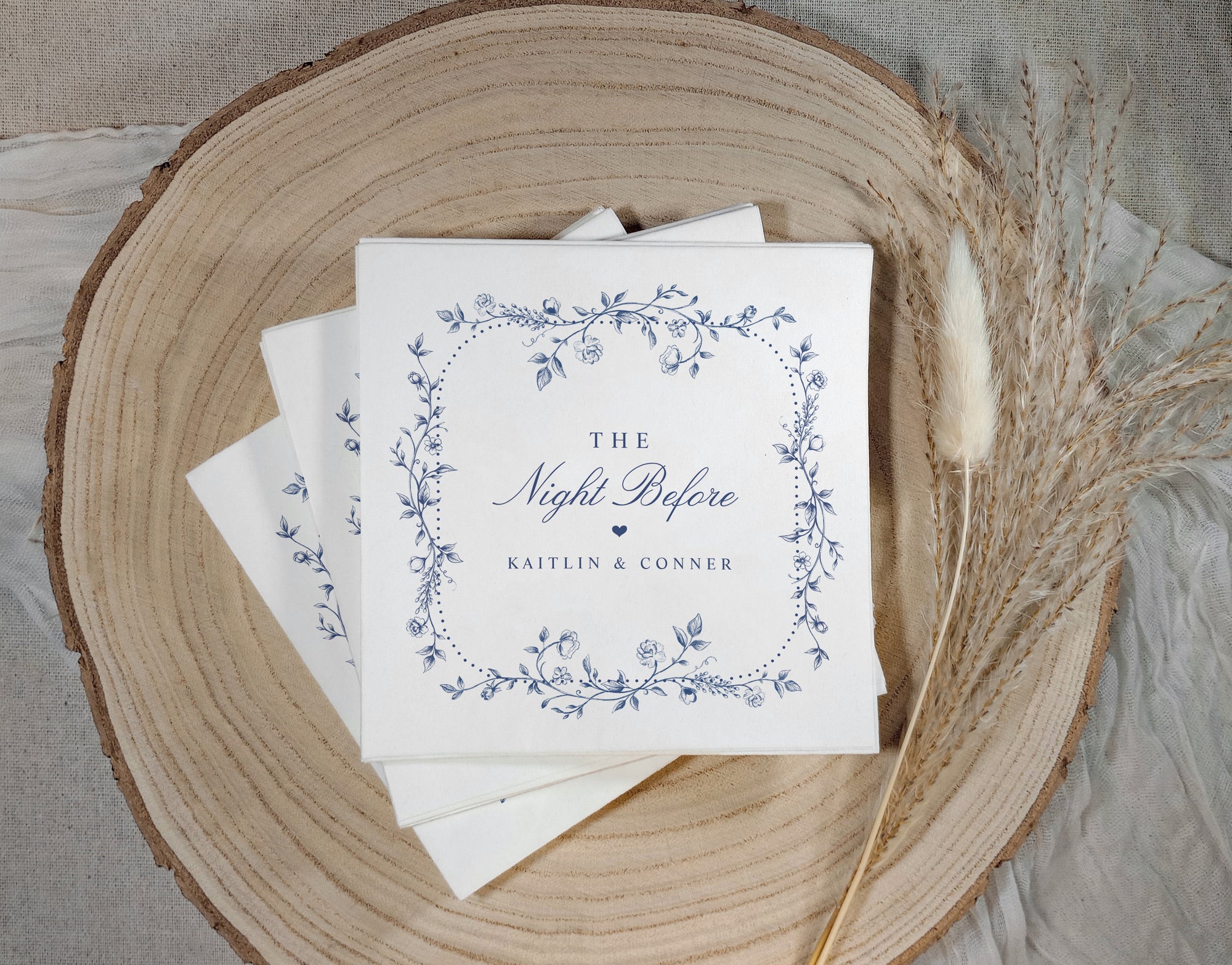 Vintage French navy blue rehearsal dinner napkins with elegant chinoiserie floral frame and "The Night Before" script.