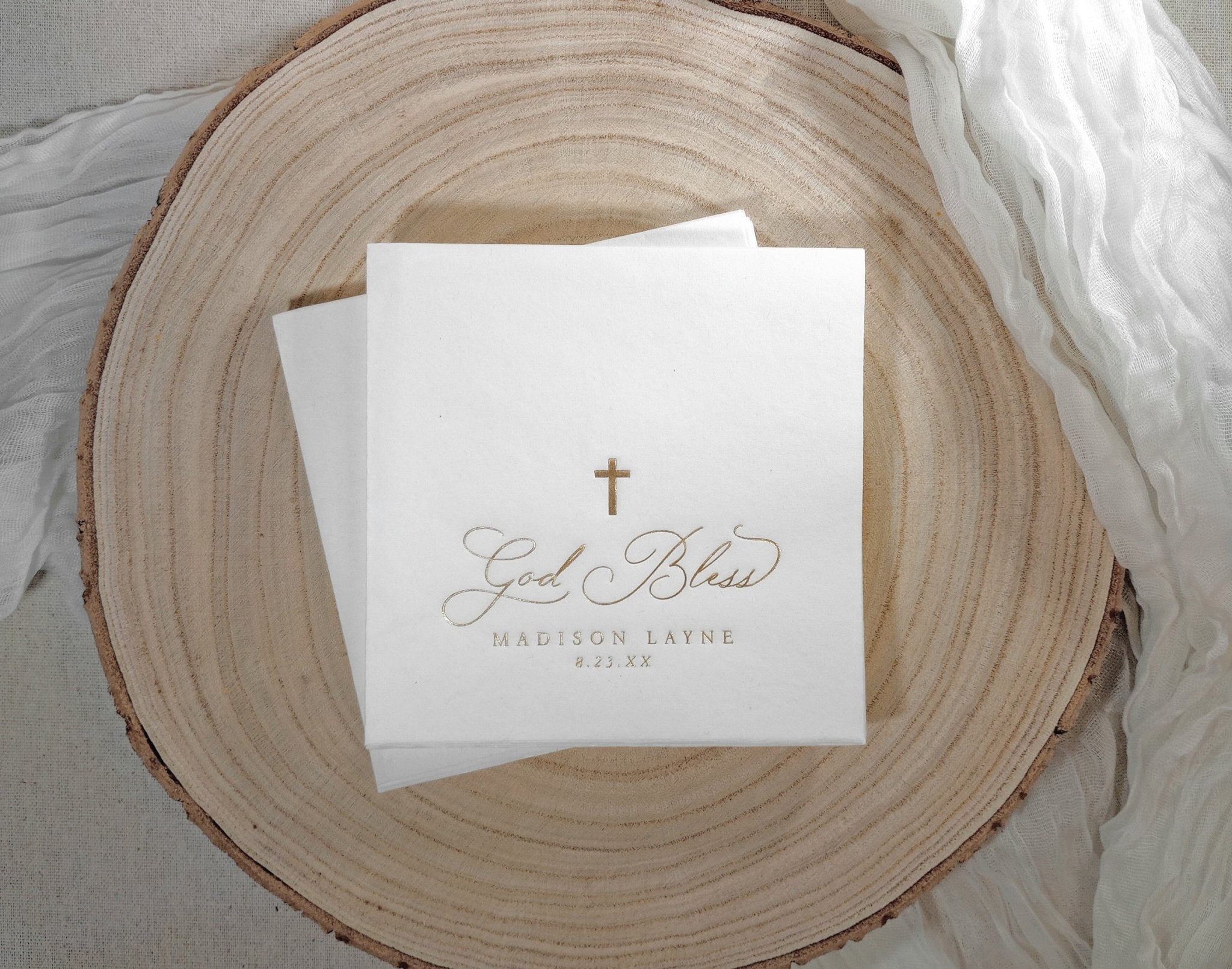 White paper napkin for baptism or christening with gold foil stamped cross