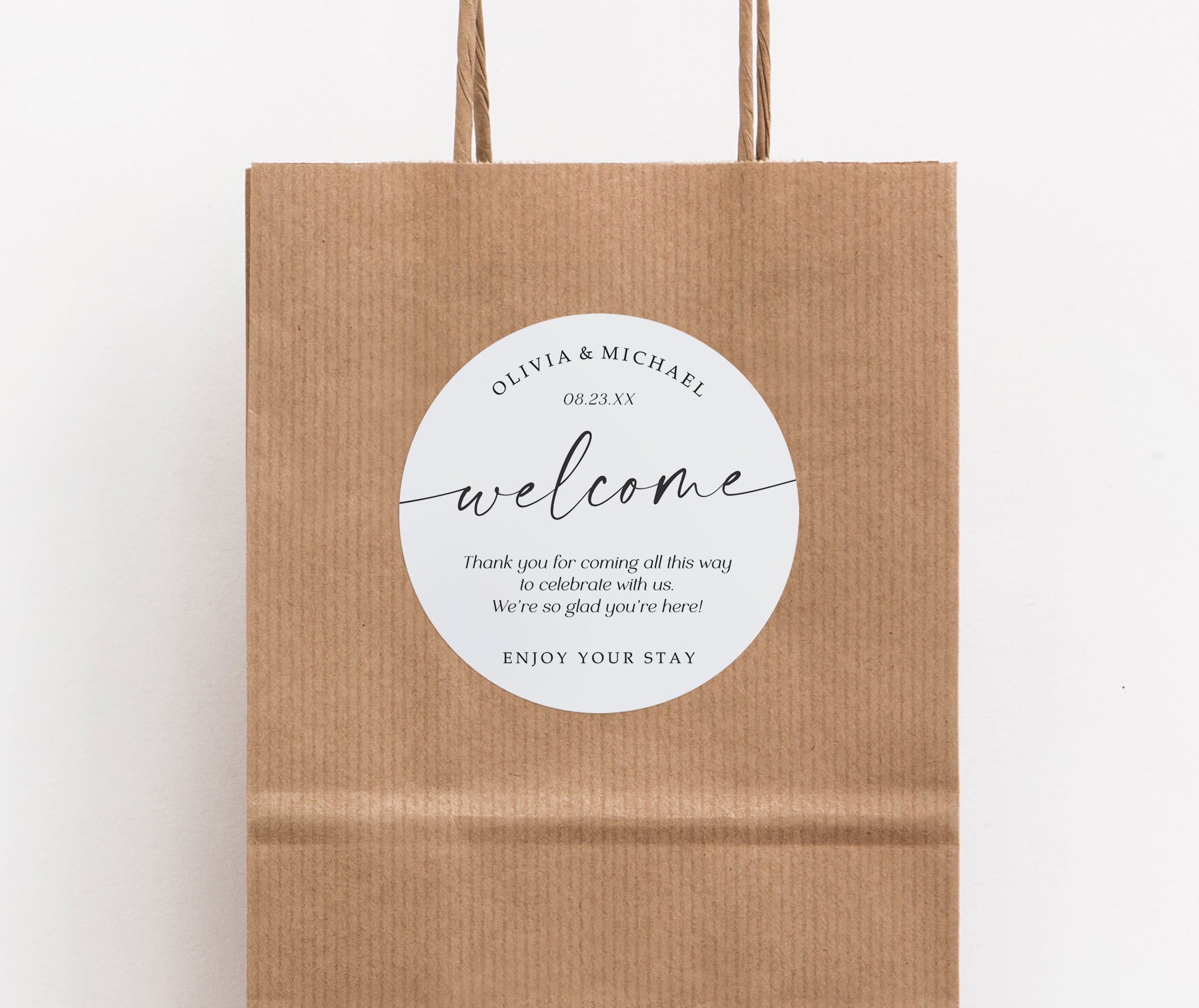 Close-up of personalized welcome sticker featuring modern script design