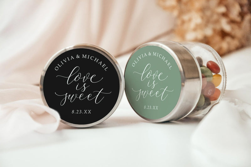 Two round love is sweet wedding stickers in black and green on tins with candy