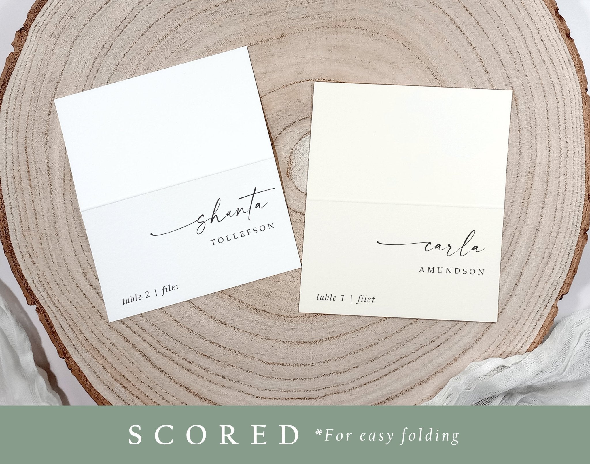 Custom scored place cards for weddings in modern calligraphy style, ready to fold