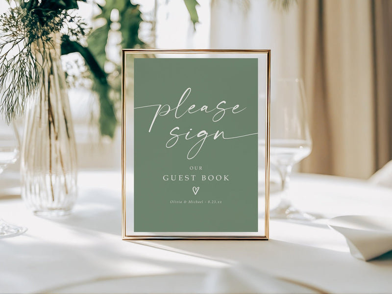 Sage Green wedding sign on a table with decorative elements