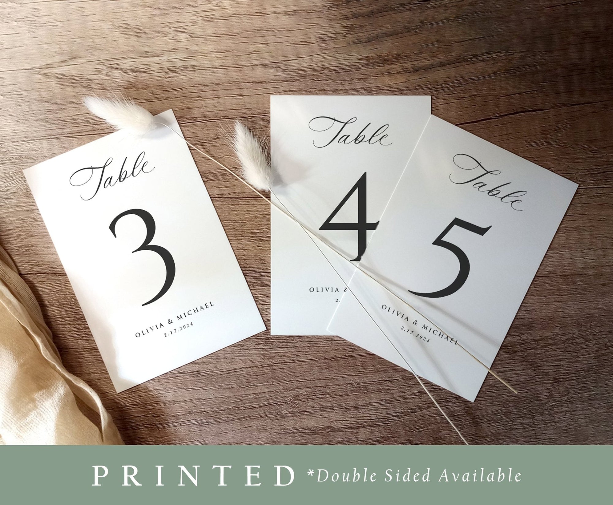 Set of classic 4x6 printed table numbers 3 through 5 displayed with neutral tones and soft lighting.