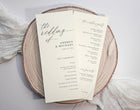 Front and back printed wedding program featuring order of ceremony and wedding party