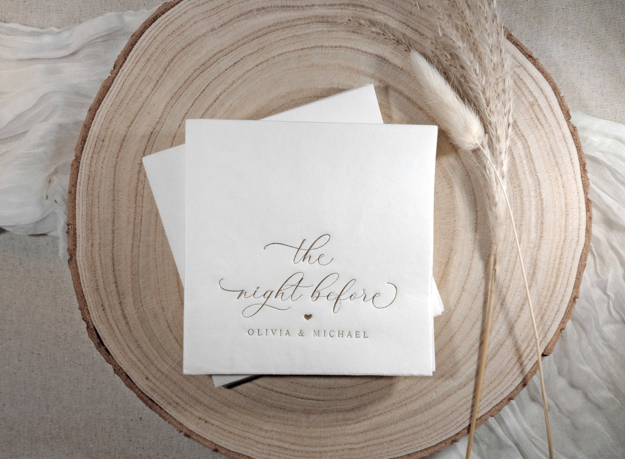 Personalized foil stamped rehearsal dinner napkin in gold script